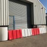Flood barrier system deployed warehouse